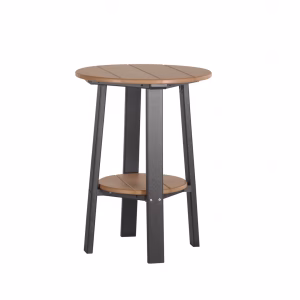 A round wooden side table with a lighter brown top and darker brown base stands against a white background, featuring three black legs and a lower shelf.