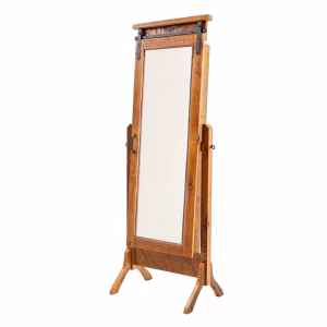 A wooden freestanding mirror with a rustic finish, black metal frame, and curved top stands on four legs, reflecting a white surface.