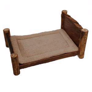A wooden dog bed with a natural, rustic finish and curved headrest holds a beige, plush cushion on a white background.
