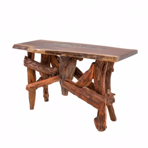 A wooden table with a natural, rough-hewn edge and intricate branch design stands against a white background, showcasing a rustic aesthetic.