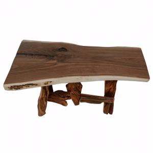 A dark brown wooden coffee table with a natural, rough texture and a central circular design is supported by a black metal frame.