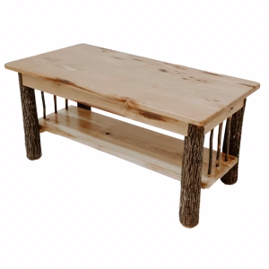 A light-colored wooden coffee table with a natural, rustic appearance features an open shelf and vertical tree branch legs.