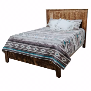 A wooden bed with a geometric quilt and two white pillows is set against a white background, showcasing a rustic charm.