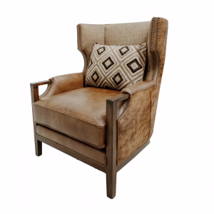 A brown leather armchair with wooden frame and geometric patterned pillow stands against a white background, exuding a classic yet modern style.