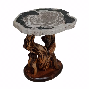 A round table with a dark brown base and white top featuring a black and gray tree trunk design stands against a white background.