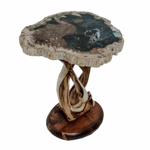 A dark wood and stone table features a natural, rough-hewn finish and unique design, with a twisted base and a striking black and gray stone top.