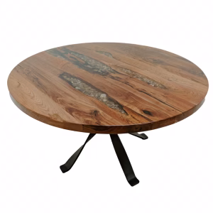 A round wooden table with a natural edge and resin inlay of gray and white stones is accompanied by a black metal base with curved legs.
