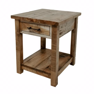 A light-colored wooden end table with a drawer and shelf stands against a white background, showcasing a simple and uncluttered design.