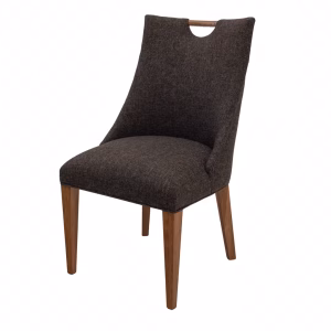 A brown upholstered chair with a curved backrest and wooden legs stands against a white background, showcasing its intricate design.