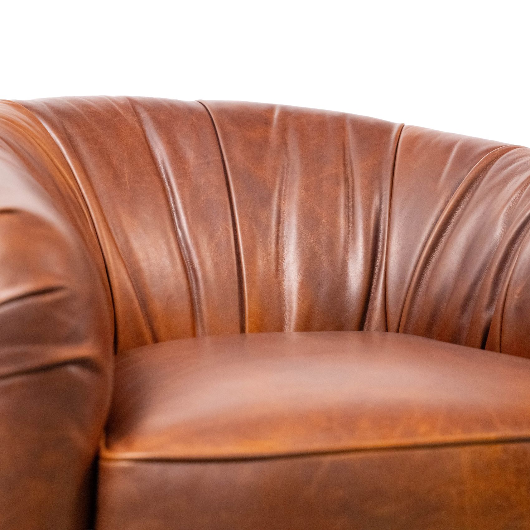small leather swivel chair with cowhide