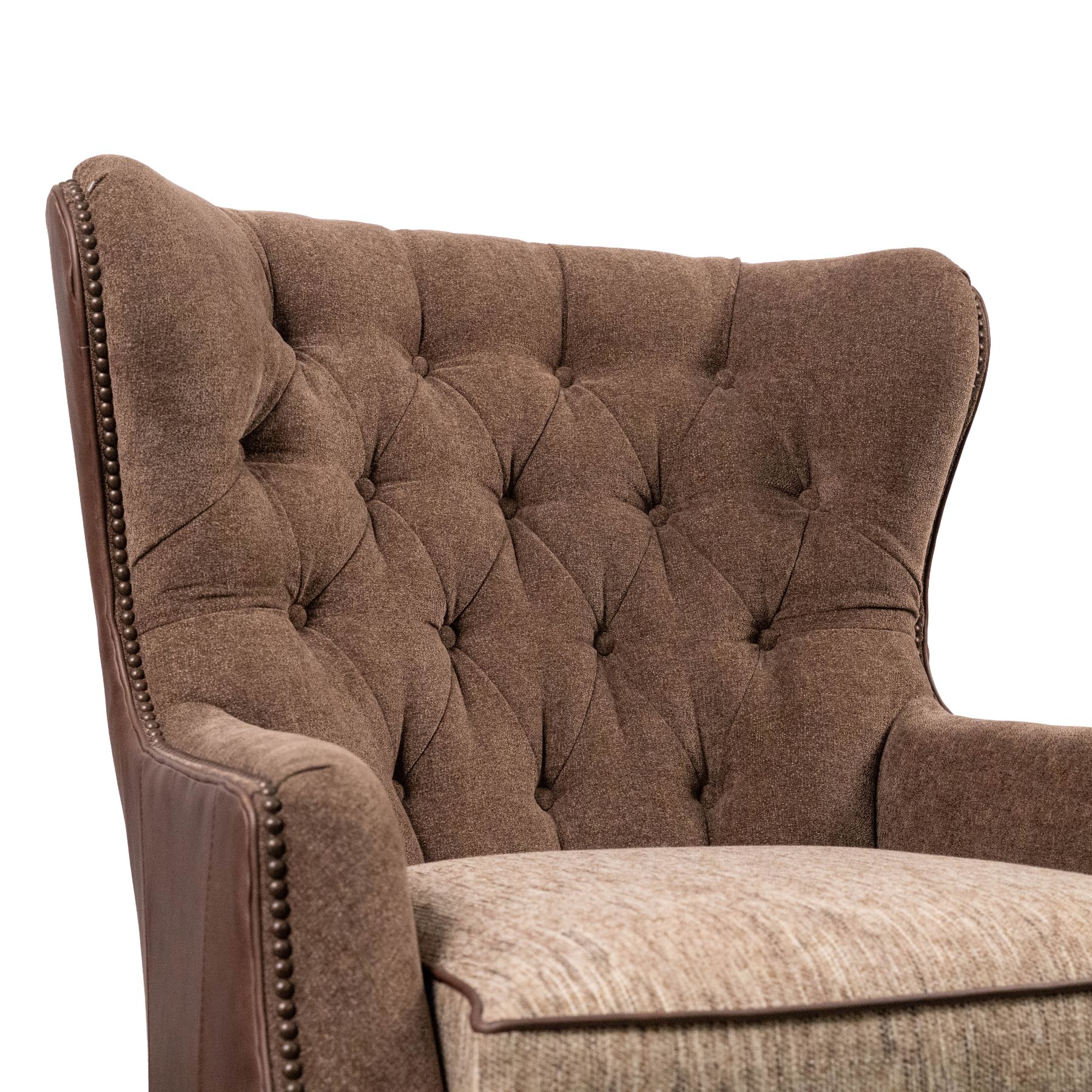 wingback leather and fabric chair with tufted back