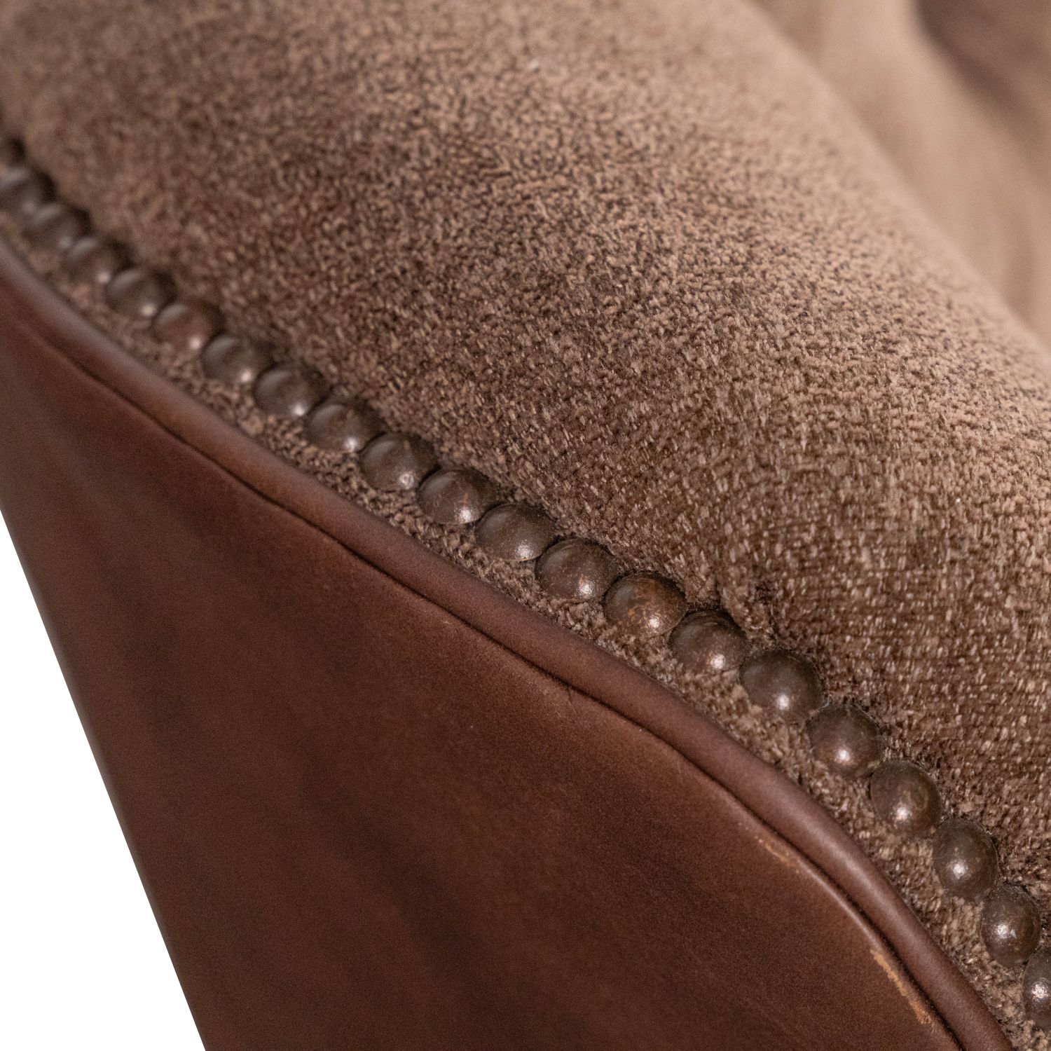 wingback leather and fabric chair with tufted back