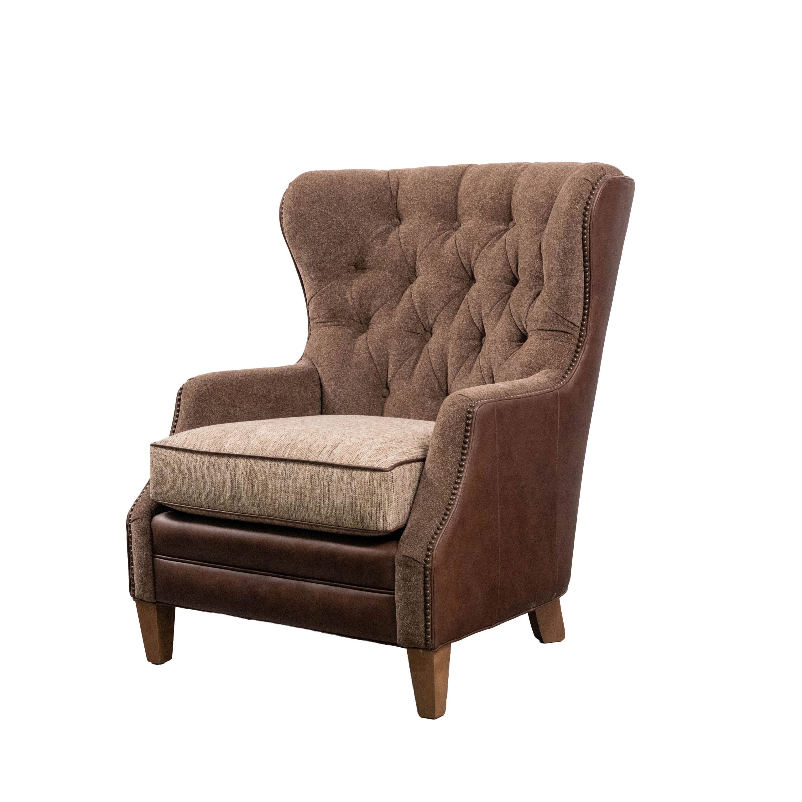 wingback leather and fabric chair with tufted back