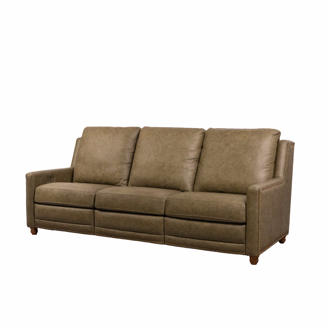 A tan three-seater leather sofa with wooden legs against a plain white background.
